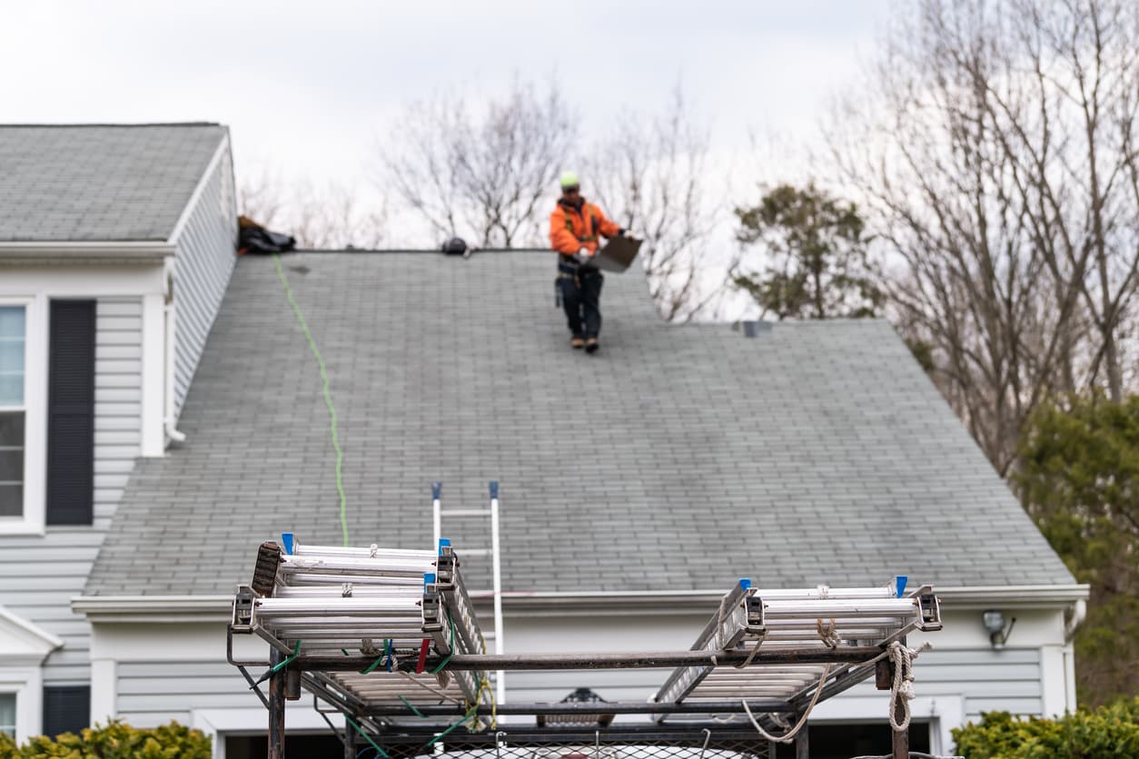 Wind and storm damaged commercial roof edge in Fort Myers